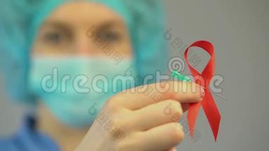 女医生手持红丝带，国际艾滋病，艾滋病毒宣传标志